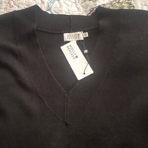 Rich black Molly Bracken sleeveless sweater. Women’s size M. New with tags.